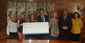 Donaci&oacute; caixa bank per Garrofers